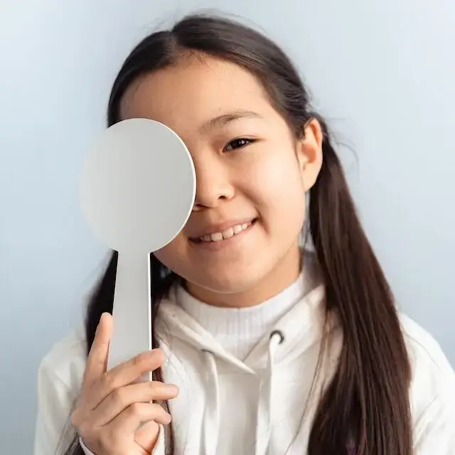 Asian Girl At An Eye Exam